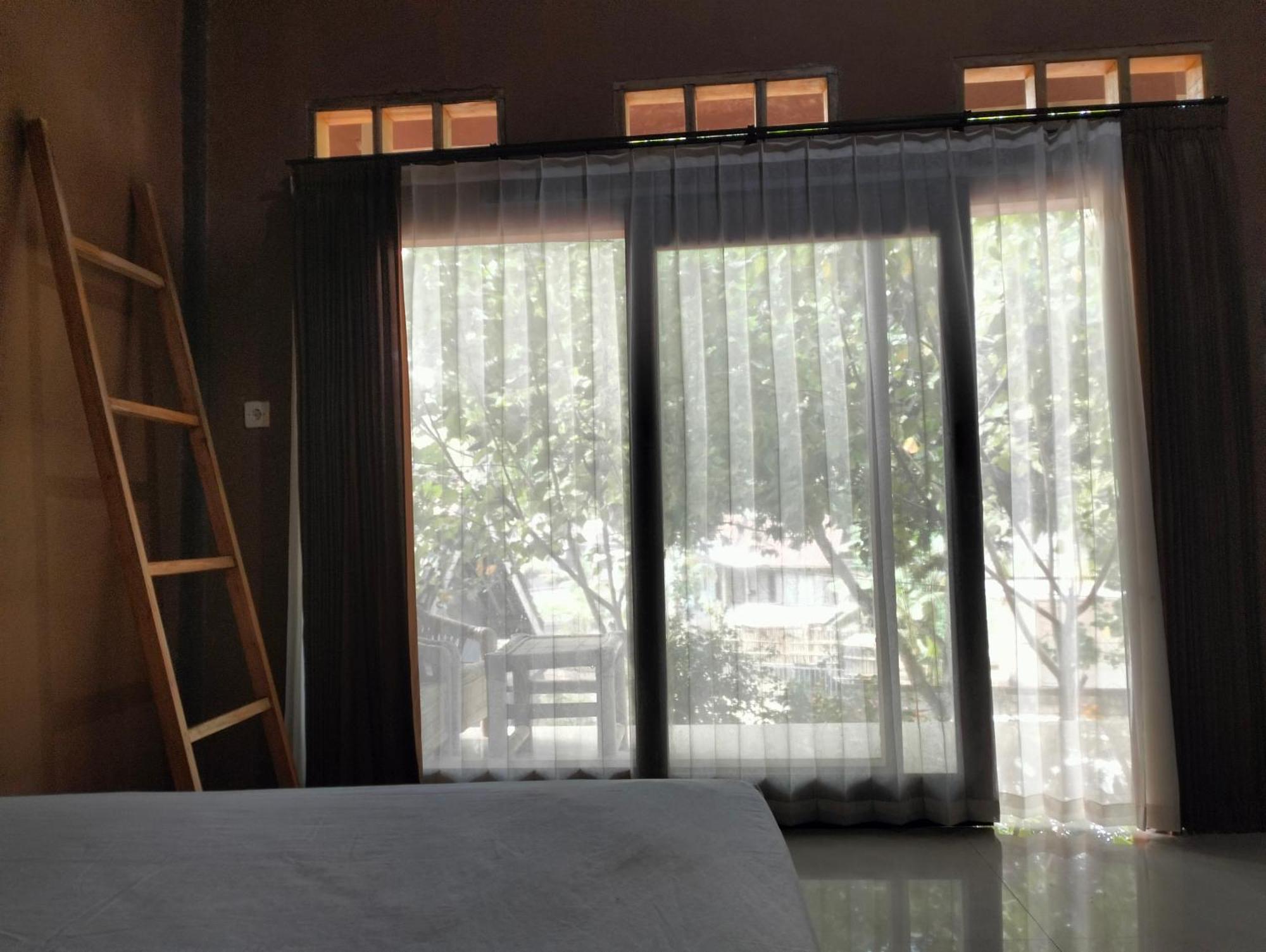 Fullmoon Homestay Kuta  ภายนอก รูปภาพ